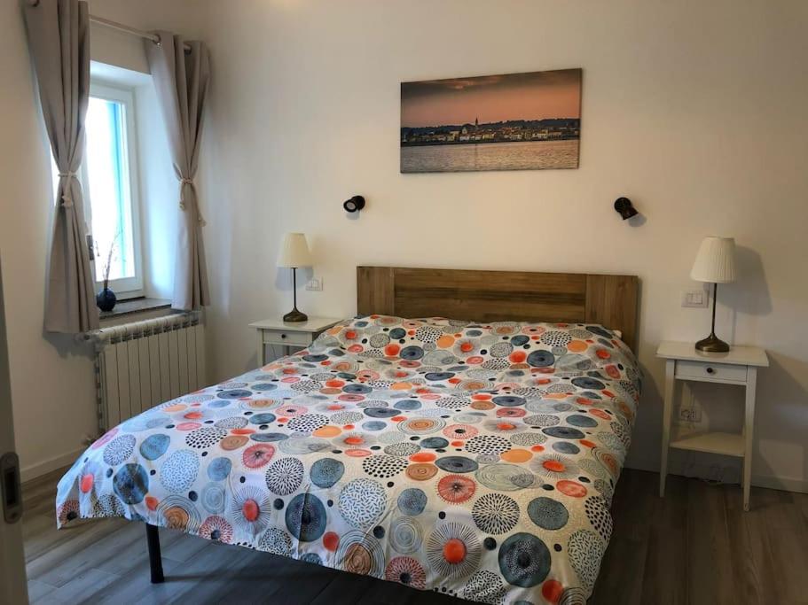 Postel nebo postele na pokoji v ubytování 'Piccolo Paradiso'