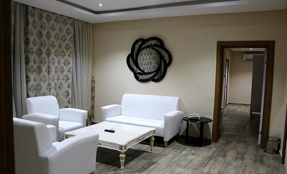 Posezení v ubytování Ellyxville Hotel