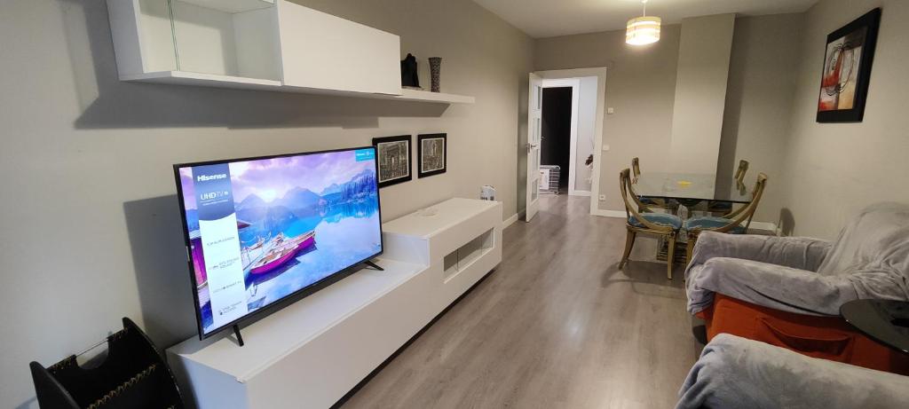 TV a/nebo společenská místnost v ubytování San Anton Centro Apartment