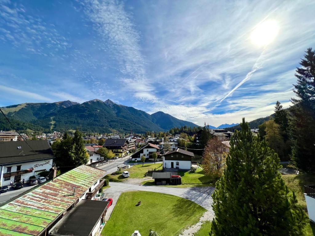 a view of a small town with mountains in the background at Haus St. Georg in Seefeld in Tirol