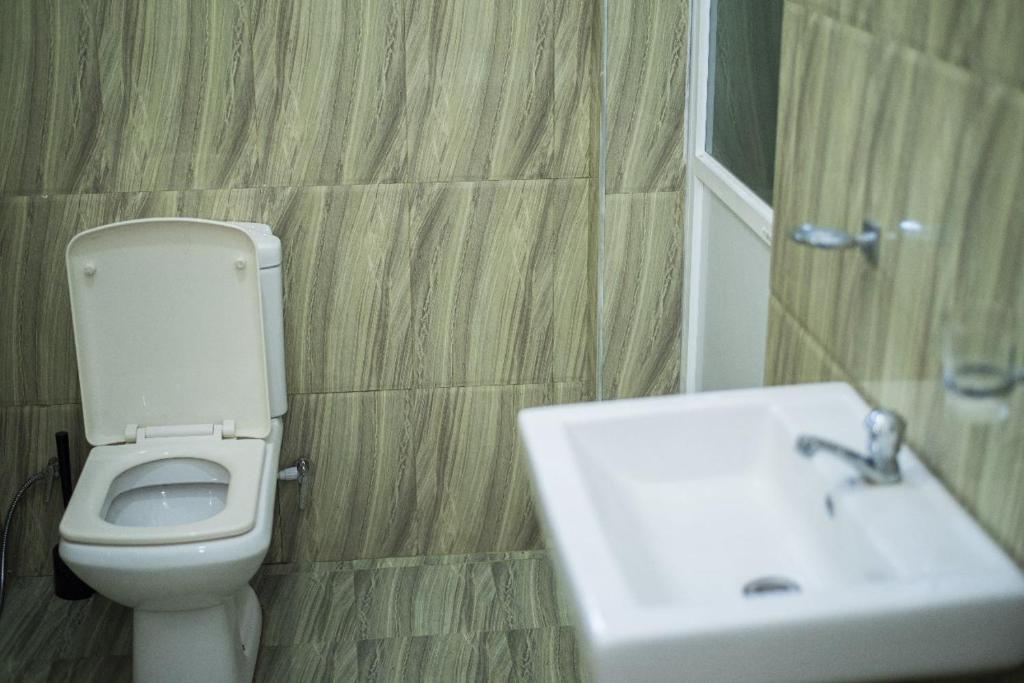Koupelna v ubytování Grand Okka Hotel