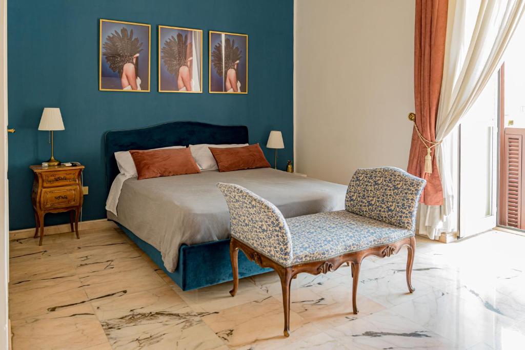En eller flere senge i et værelse på B&B Ruffo di Bagnara Palazzo Monumentale