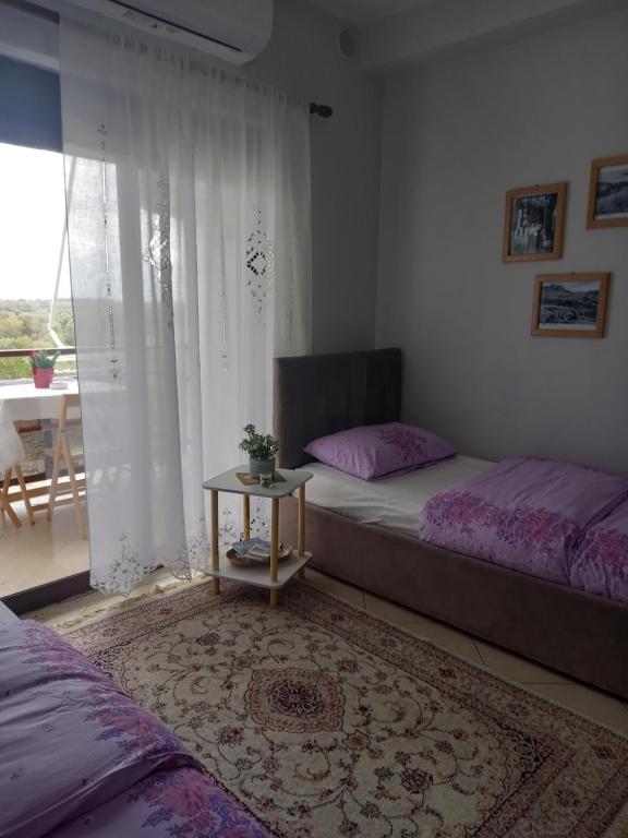 Postel nebo postele na pokoji v ubytování Panoramic apartment