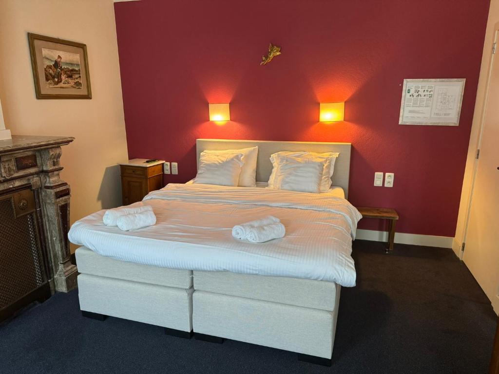 Postel nebo postele na pokoji v ubytování Hotel Rubenshof