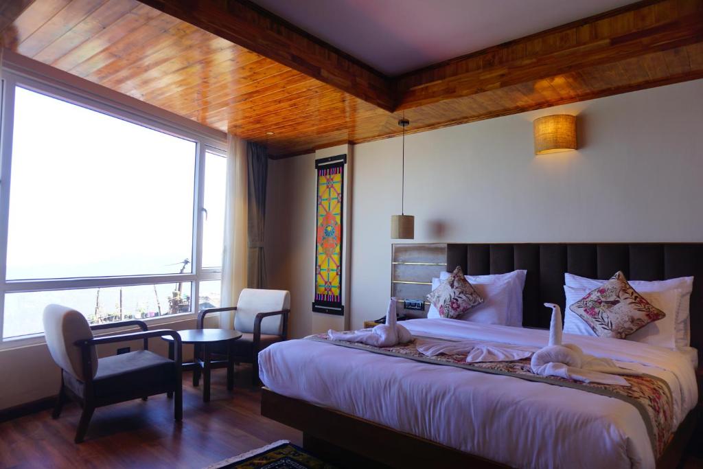 Postel nebo postele na pokoji v ubytování Gakhil Boutique Hotel