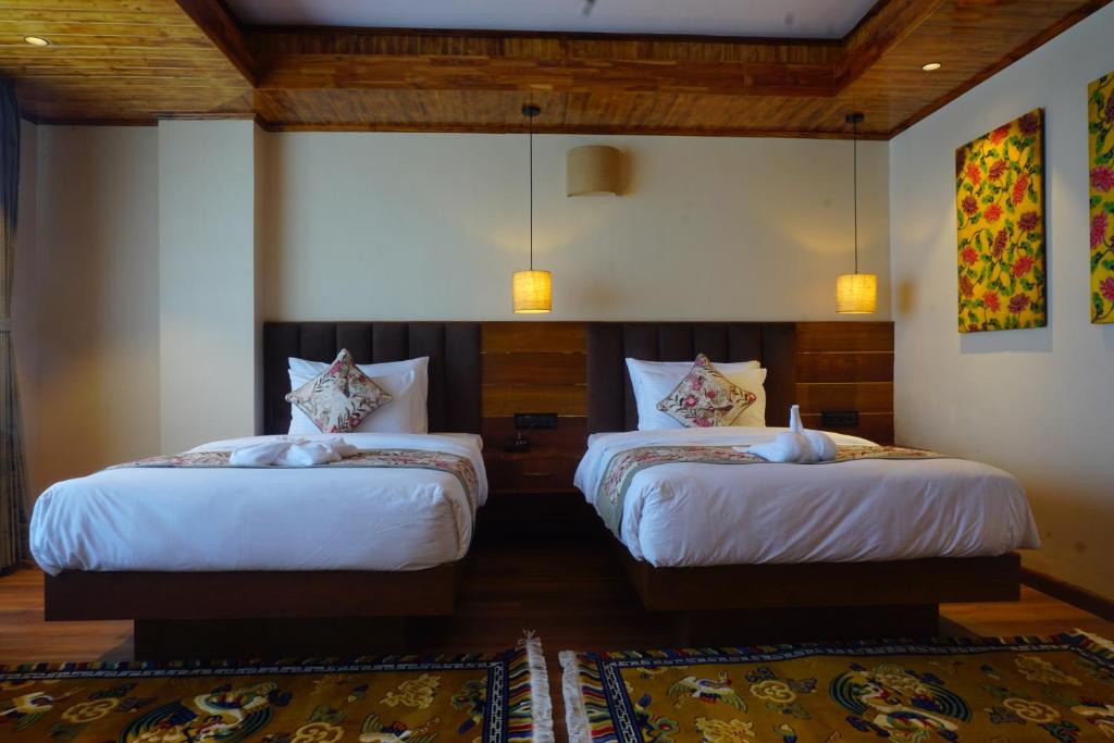 Postel nebo postele na pokoji v ubytování Gakhil Boutique Hotel