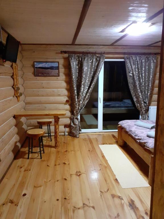 Postel nebo postele na pokoji v ubytování Sadyba Cherry
