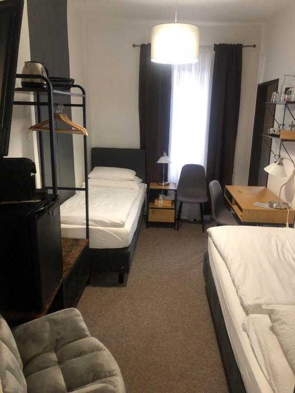 Postel nebo postele na pokoji v ubytování Penzion U Kašpara
