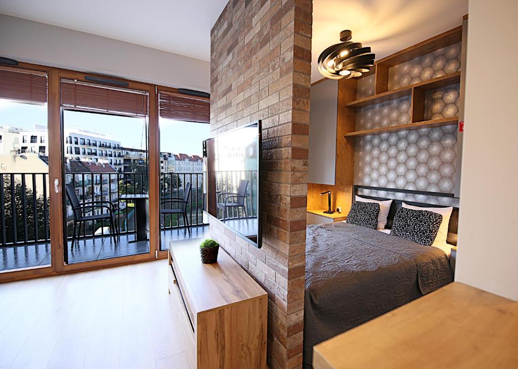 Μια τηλεόραση ή/και κέντρο ψυχαγωγίας στο Apartimento Bulvar Prima