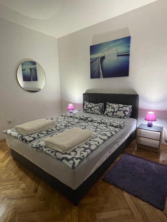 Postel nebo postele na pokoji v ubytování Apartman Venera