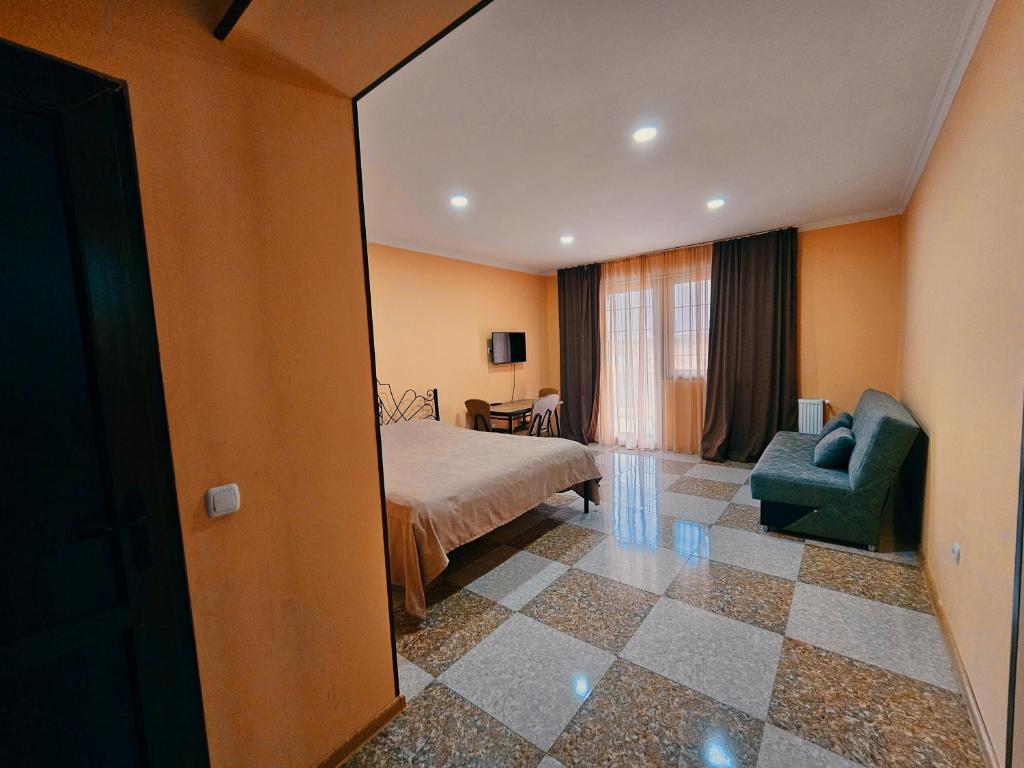 Postel nebo postele na pokoji v ubytování Tourist Complex Khomi