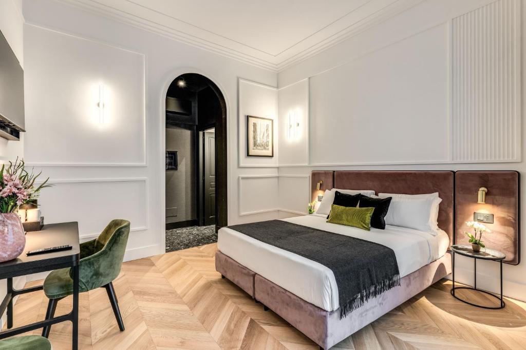 Postel nebo postele na pokoji v ubytování Residenza Piranesi Boutique Hotel