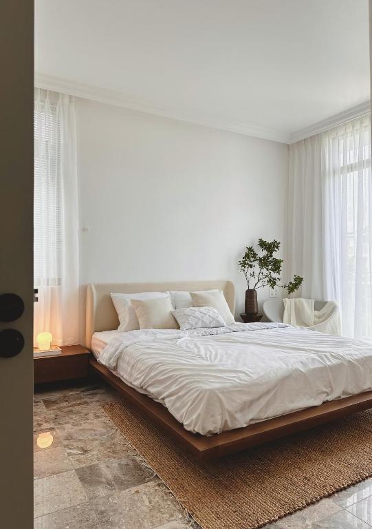 Postel nebo postele na pokoji v ubytování BeLam in Hue Villa
