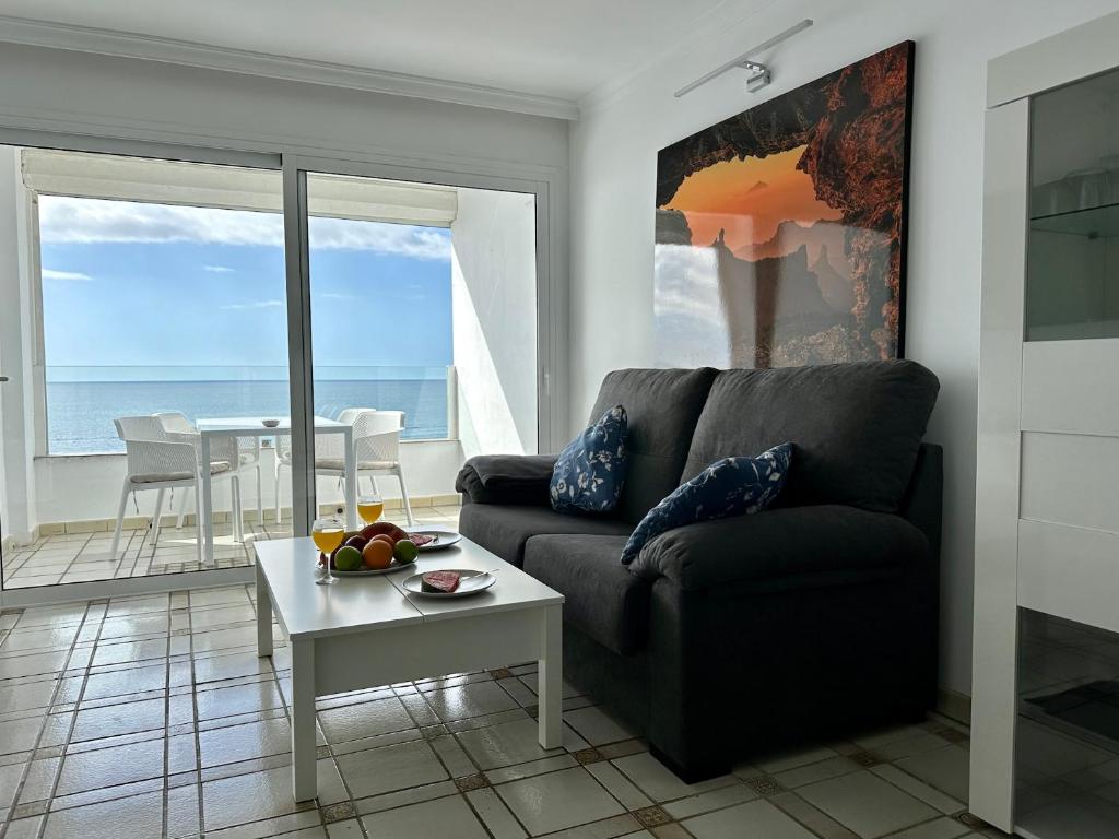 Posedenie v ubytovaní New holiday apartment right on the beach