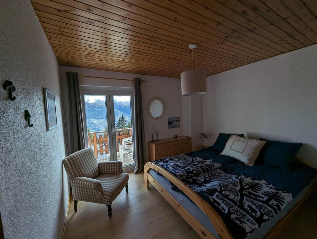 Voodi või voodid majutusasutuse Chalet Cactus - 4 Vallées toas