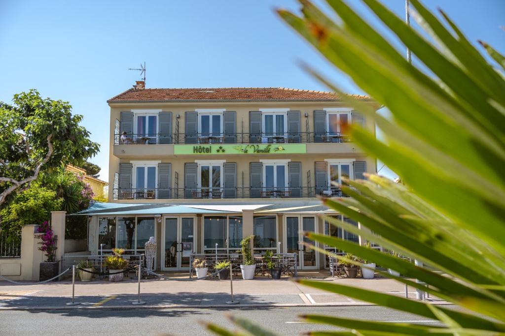 a hotel with a view of the front of the building at Hôtel du Bord de Mer "Le Vanillé" in Cagnes-sur-Mer