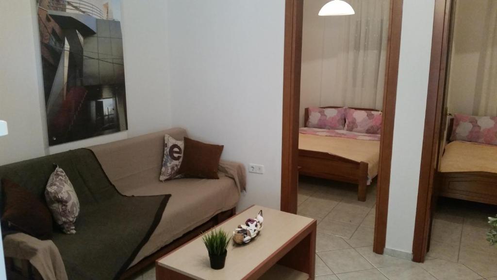 Łóżko lub łóżka w pokoju w obiekcie Vryzas Resort