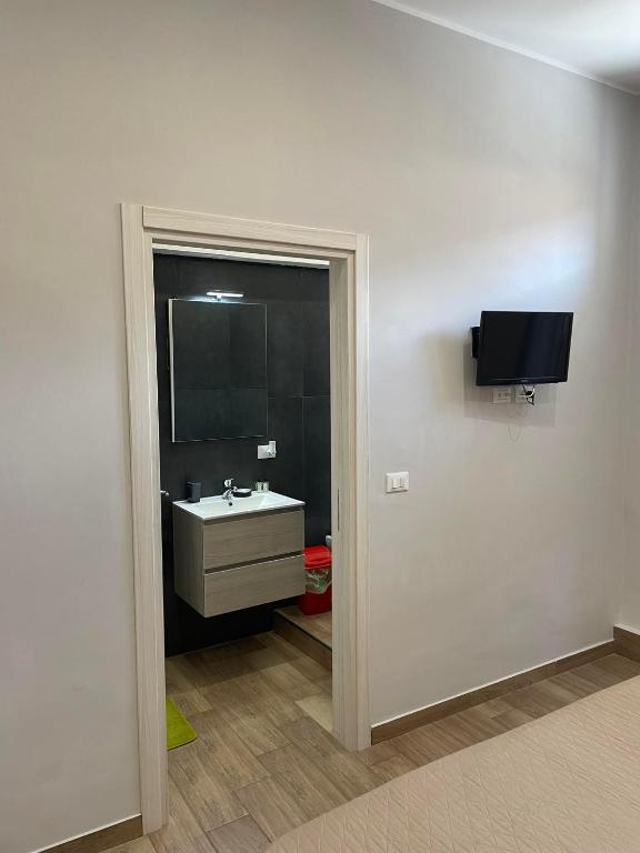 TV a/nebo společenská místnost v ubytování Exclusive B&B
