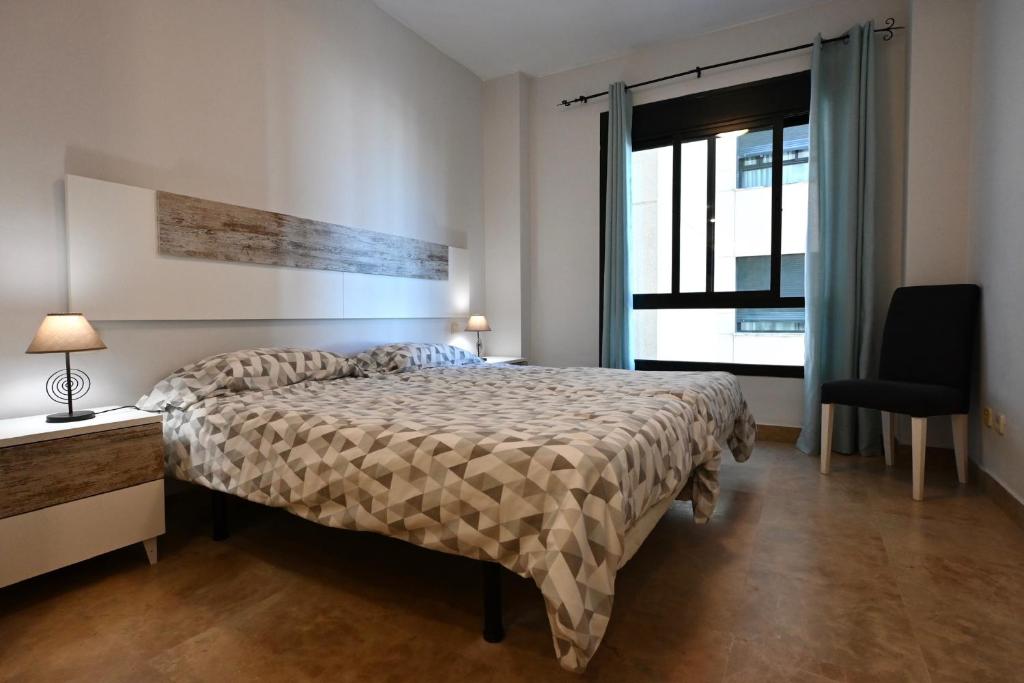 Una cama o camas en una habitación de Centro y Playa!