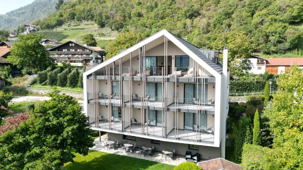 an aerial view of a house in the mountains at Guesthouse Karnatsch in Parcines