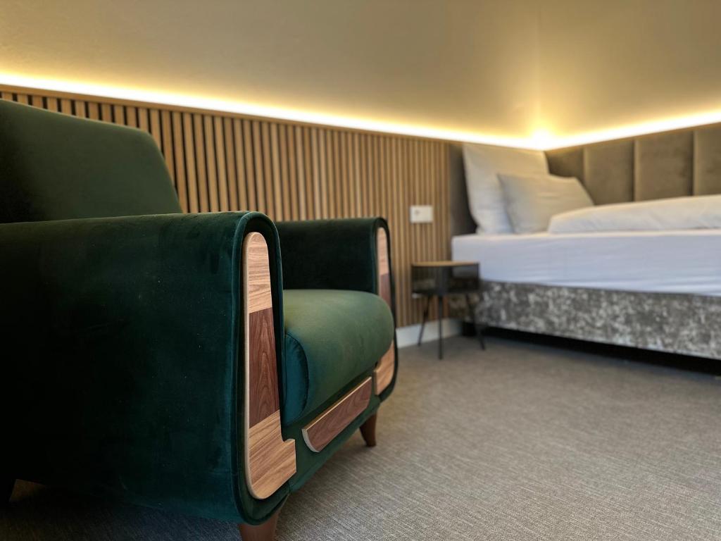 Postel nebo postele na pokoji v ubytování Boutique Hotel GreenLeaf