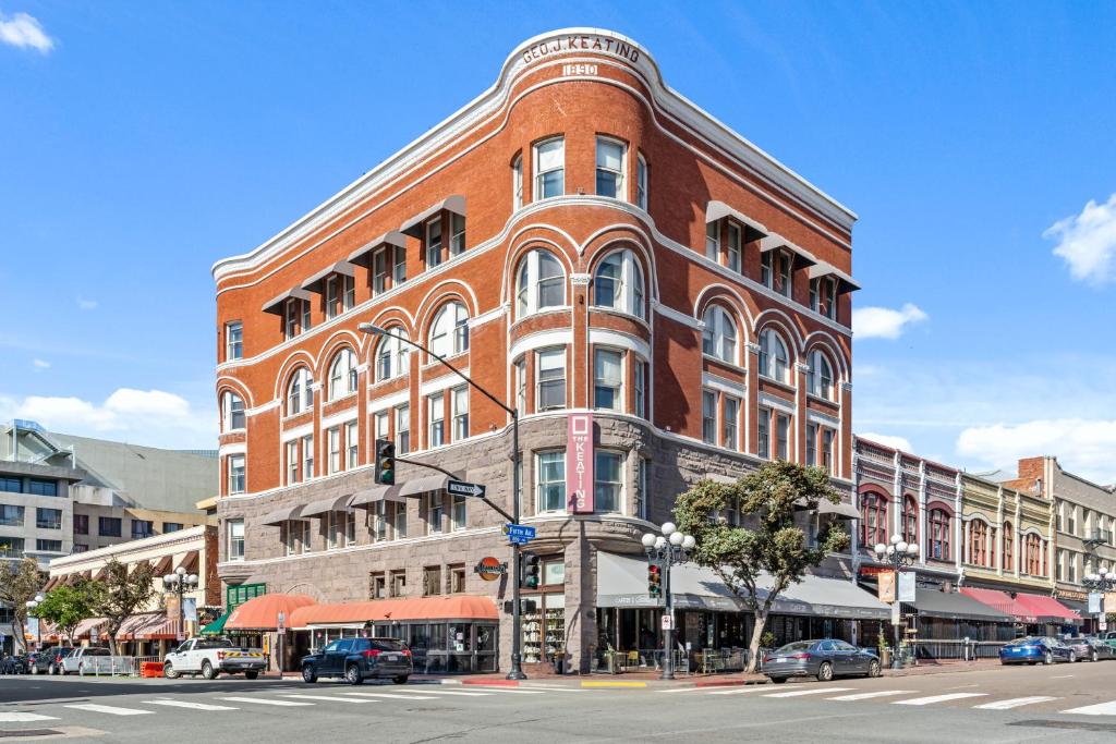 a large red brick building on a city street at Keating in San Diego