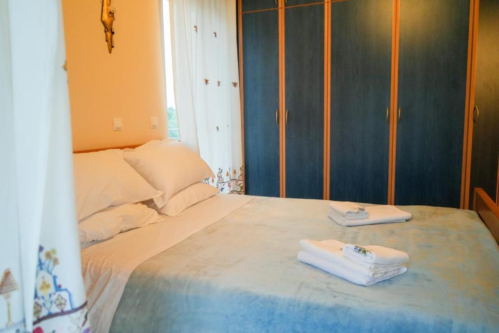 Postel nebo postele na pokoji v ubytování Villa Mykines