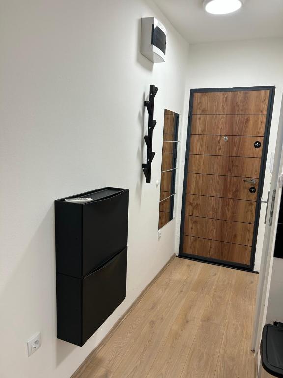TV a/nebo společenská místnost v ubytování MD STUDIO