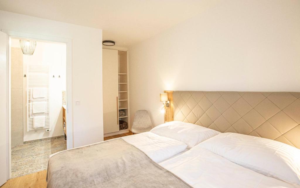 Postel nebo postele na pokoji v ubytování Refugium Bad Ischl