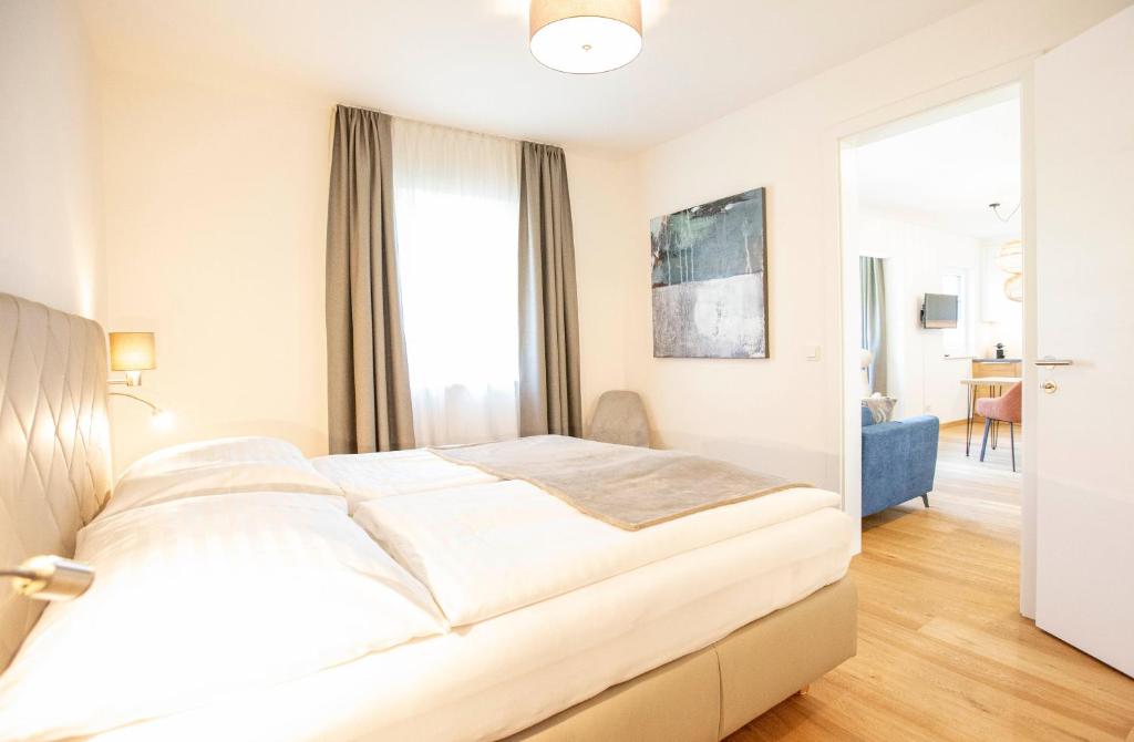 Postel nebo postele na pokoji v ubytování Refugium Bad Ischl
