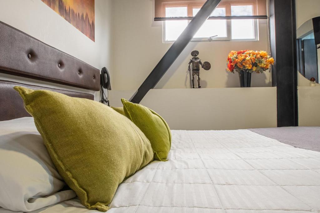 Postel nebo postele na pokoji v ubytování Hotel Wess