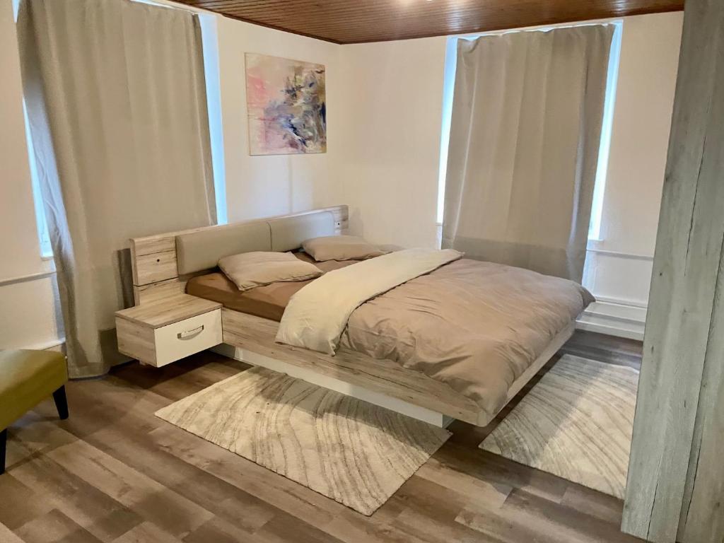 Postel nebo postele na pokoji v ubytování BLISS Basel Residence