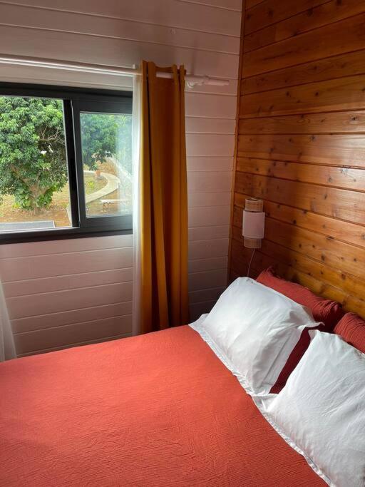 Postel nebo postele na pokoji v ubytování Austral House-chalet sud sauvage