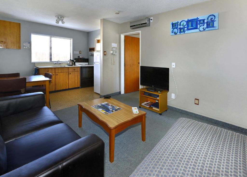 TV a/nebo společenská místnost v ubytování Classique Lodge Motel