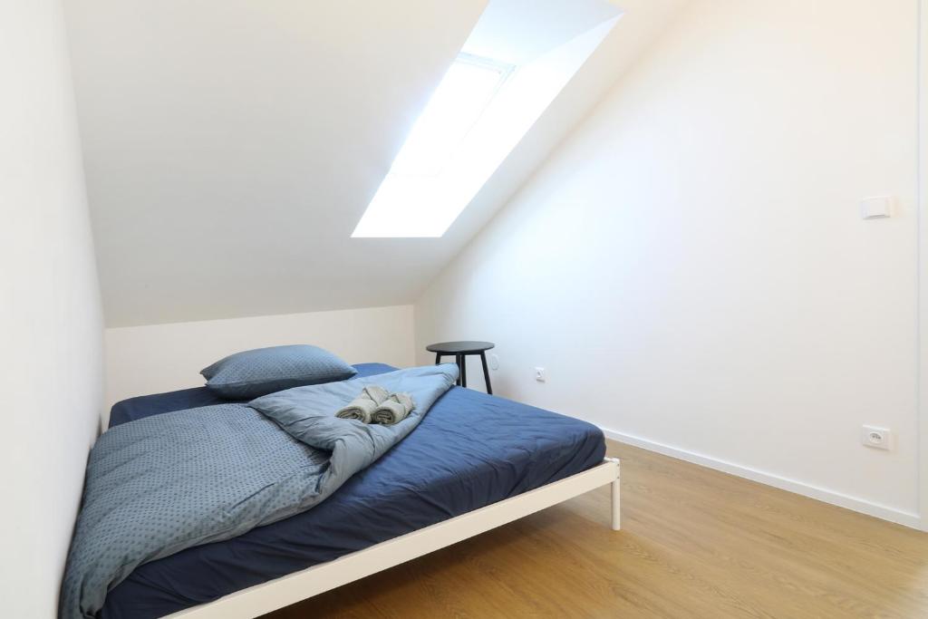 Letto o letti in una camera di Apartmán Frolkova Strážnice