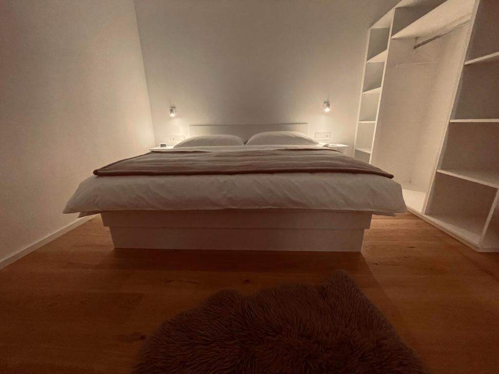 Postel nebo postele na pokoji v ubytování Die Bludenzerin