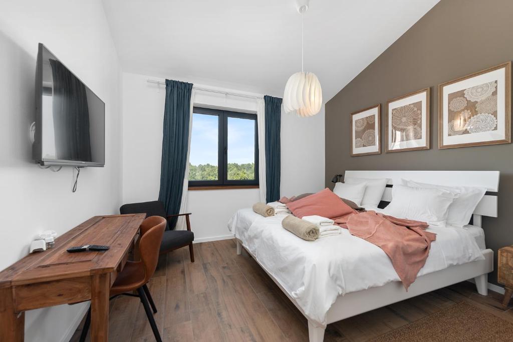 Postel nebo postele na pokoji v ubytování Villa Stellar