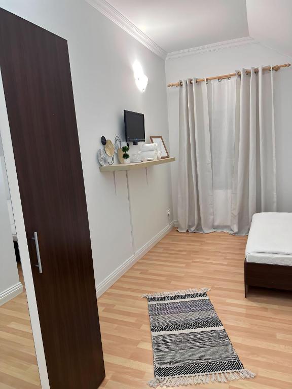 Postel nebo postele na pokoji v ubytování Hanul lui Ionut 2