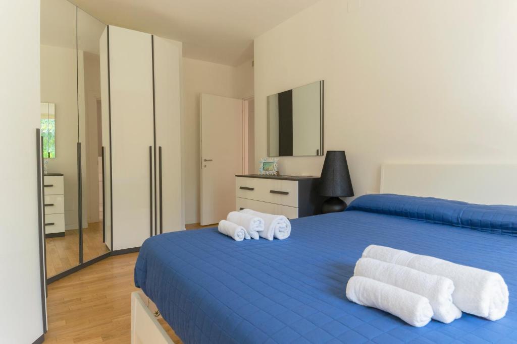 Ένα ή περισσότερα κρεβάτια σε δωμάτιο στο Vacanzainmaremma - Ingresso indipendente 5 minuti dal centro - self check-in - free parking - wi-fi