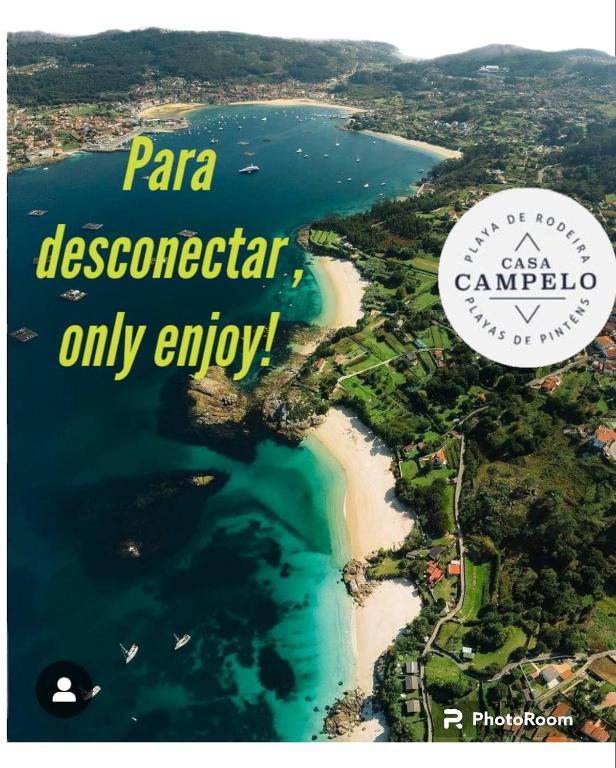 an aerial view of a beach and the ocean at Casa CAMPELO- Playas de Pinténs - CANGAS-HIO- Ría de Aldán in Cangas de Morrazo