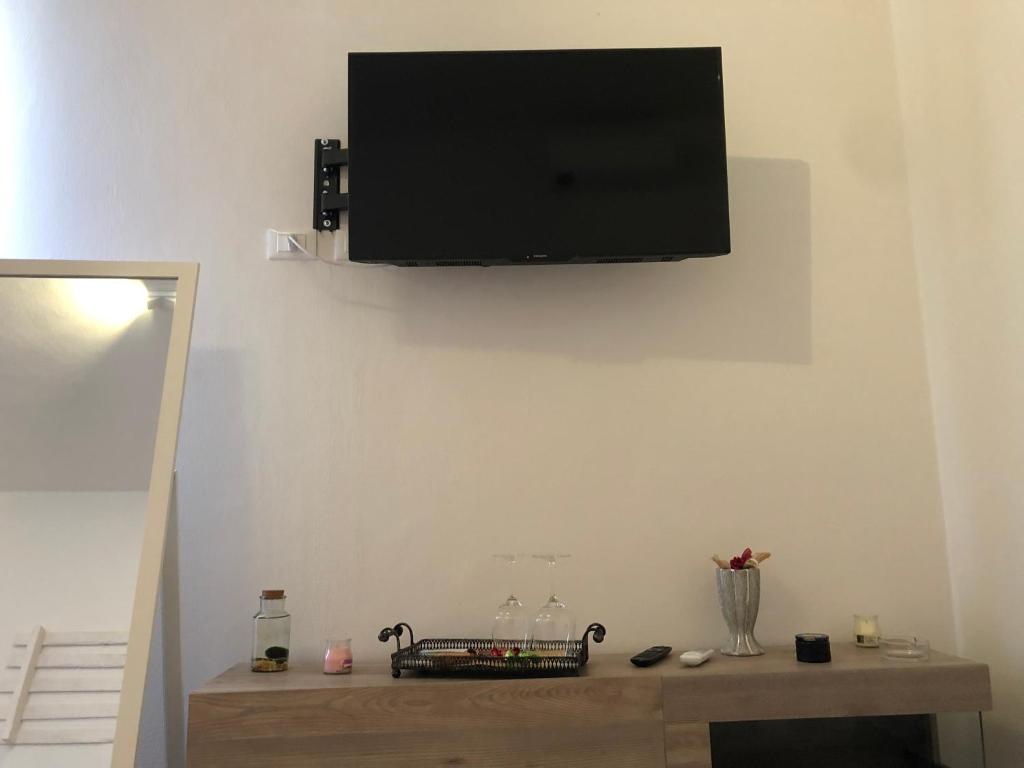 TV a/nebo společenská místnost v ubytování R&B MiDora Modena