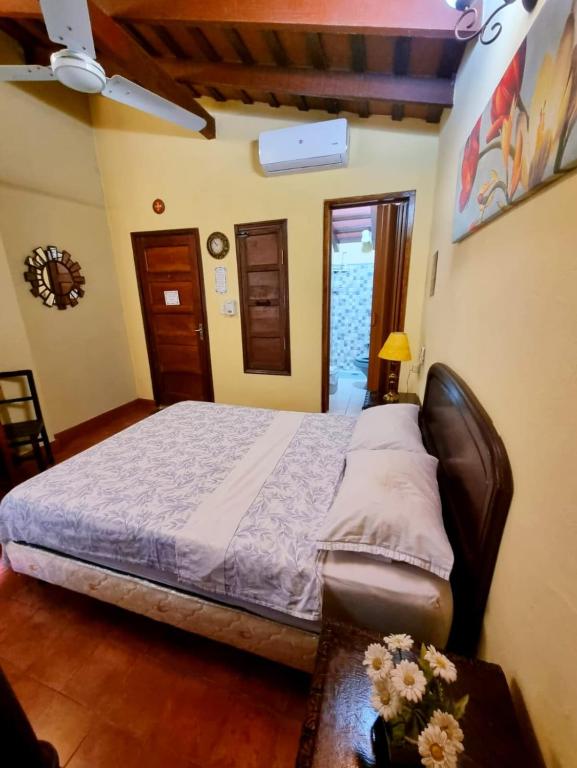 Postel nebo postele na pokoji v ubytování Hostal Mi lugar Vintage