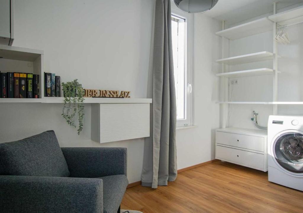 Posezení v ubytování Charmante Ferienwohnung mit Sauna und Schwimmbad im zauberhaften Bayerischen Wald