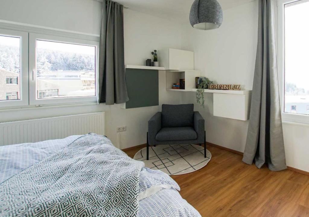Postel nebo postele na pokoji v ubytování Charmante Ferienwohnung mit Sauna und Schwimmbad im zauberhaften Bayerischen Wald