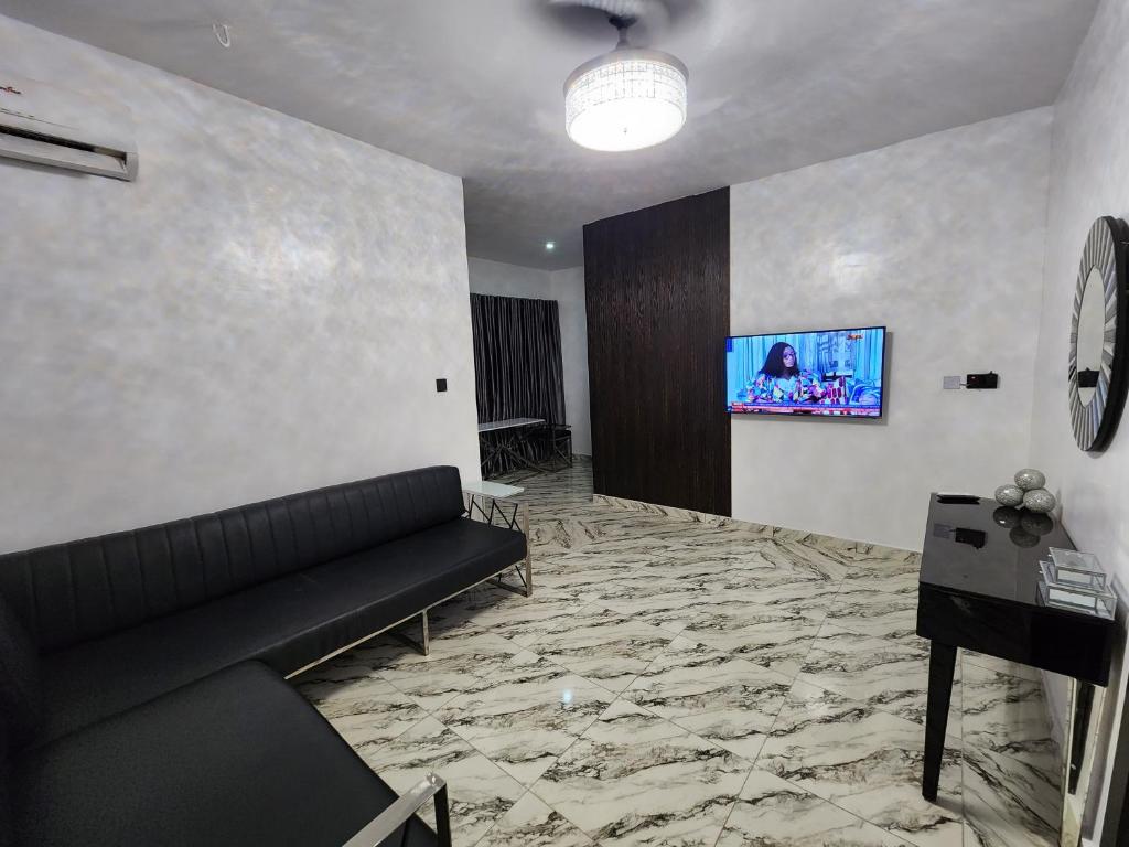 TV a/nebo společenská místnost v ubytování The Milton Apartment