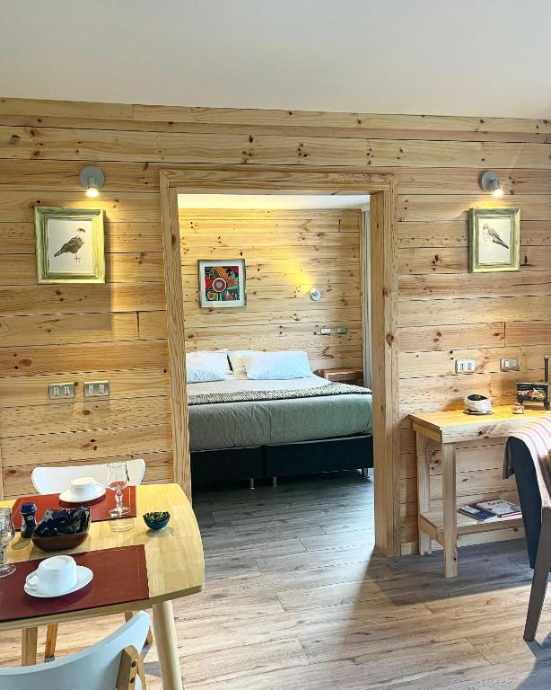 Postel nebo postele na pokoji v ubytování B&B y Cabañas Cerro Castillo