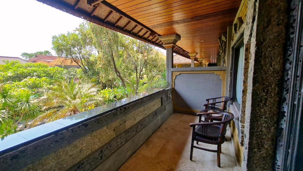 Balkón nebo terasa v ubytování Satriya Cottages