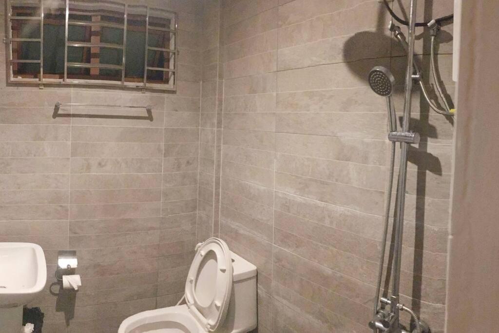Koupelna v ubytování Bagasbas House