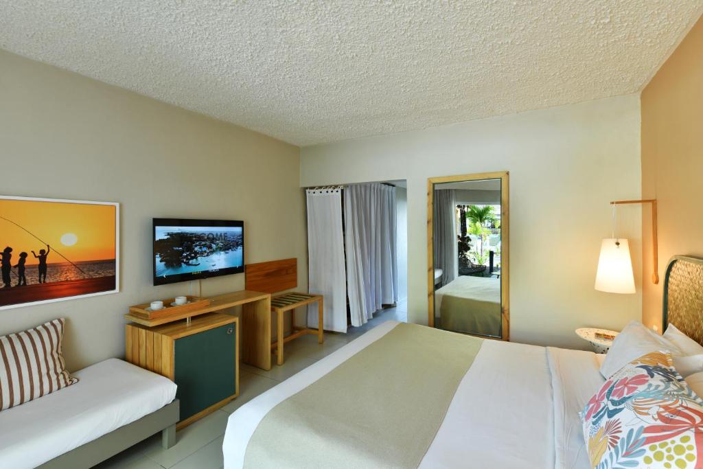 Postel nebo postele na pokoji v ubytování Veranda Palmar Beach Hotel & Spa - All Inclusive