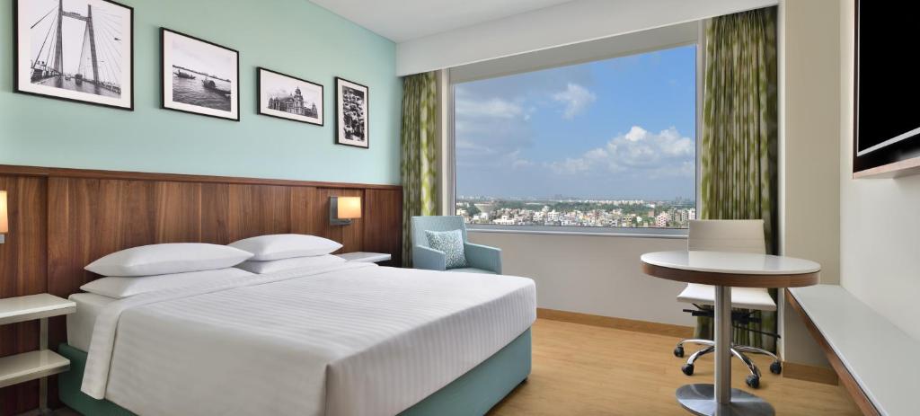 Postel nebo postele na pokoji v ubytování Fairfield by Marriott Kolkata